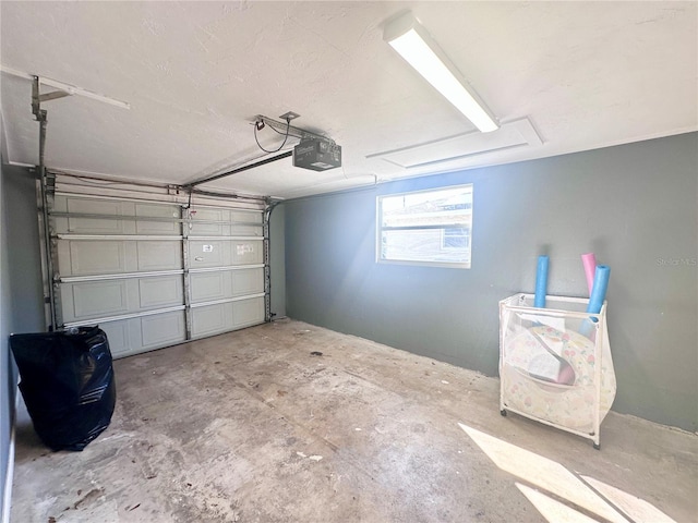 garage featuring a garage door opener