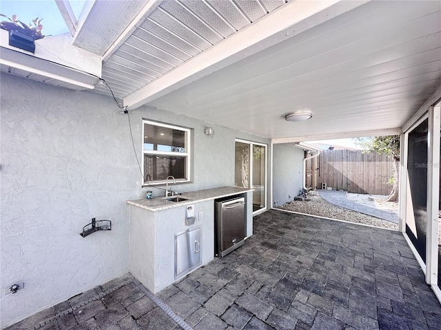 view of patio / terrace with sink and exterior kitchen