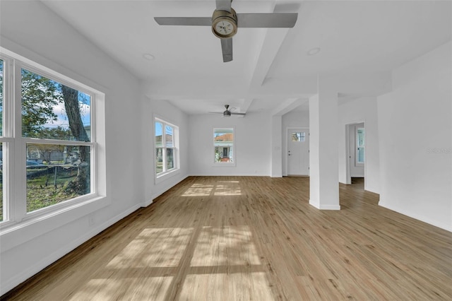 unfurnished living room featuring light wood-type flooring