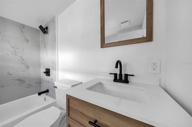 full bathroom with vanity, toilet, and tiled shower / bath combo