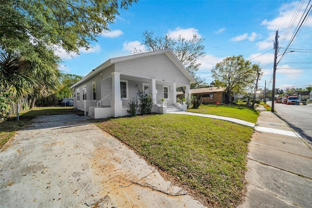 bungalow with a front lawn