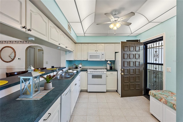 kitchen with white cabinets, ceiling fan, white appliances, and sink