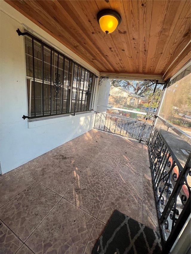 view of patio / terrace with a balcony