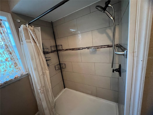 bathroom with a shower with curtain