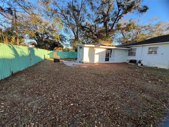 view of yard with central air condition unit