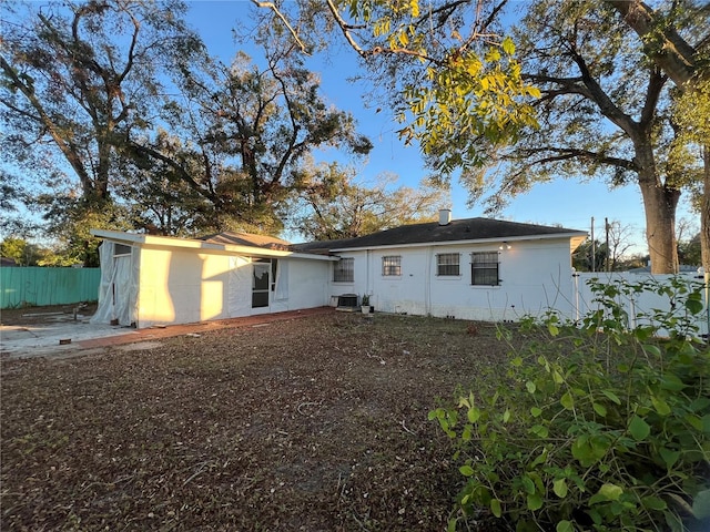 view of front of home featuring central air condition unit