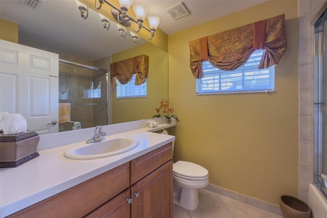 full bathroom featuring tile patterned floors, vanity, toilet, and combined bath / shower with glass door