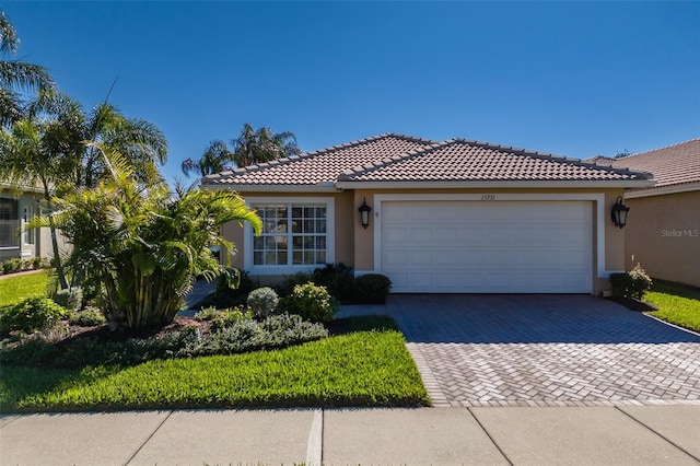 view of front of property with a garage