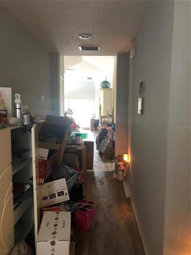 hallway with wood-type flooring