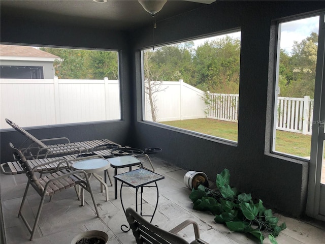 unfurnished sunroom featuring plenty of natural light