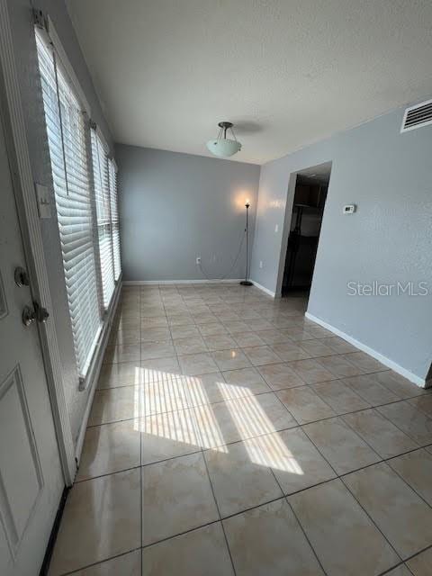 view of tiled empty room