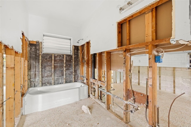 bathroom featuring a washtub