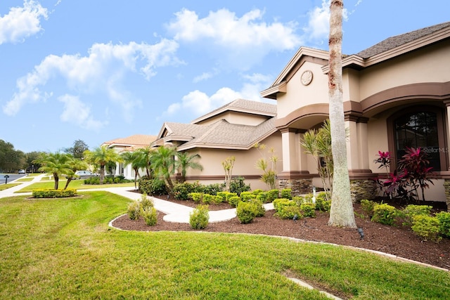 exterior space featuring a lawn