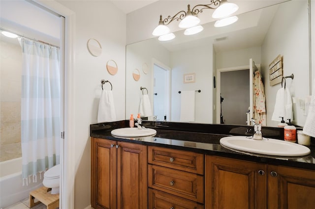 full bathroom with toilet, shower / bathtub combination with curtain, tile patterned floors, and vanity