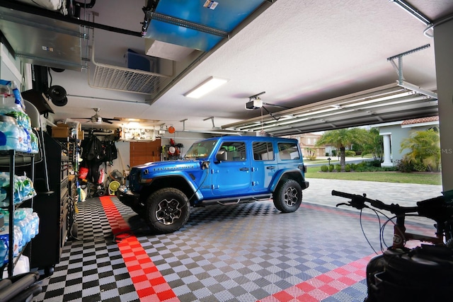 garage featuring a garage door opener