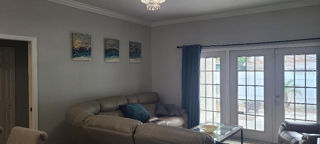 living room featuring french doors and crown molding