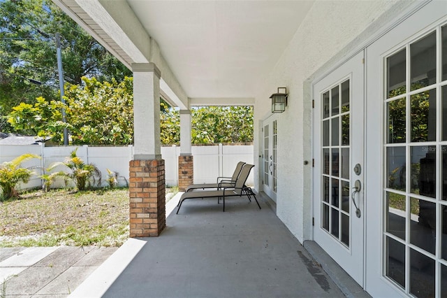3611 19th St N, Saint Petersburg, FL 33713 - fenced backyard featuring french doors and a patio area
