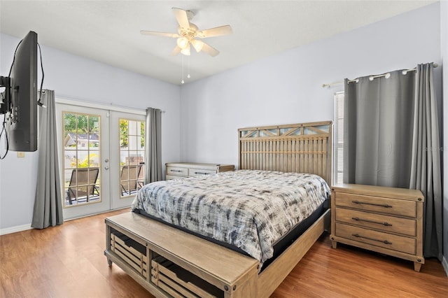 3611 19th St N, Saint Petersburg, FL 33713 - bedroom with access to outside, wood finished floors, baseboards, a ceiling fan, and french doors