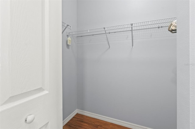 3611 19th St N, Saint Petersburg, FL 33713 - spacious closet featuring dark wood-type flooring
