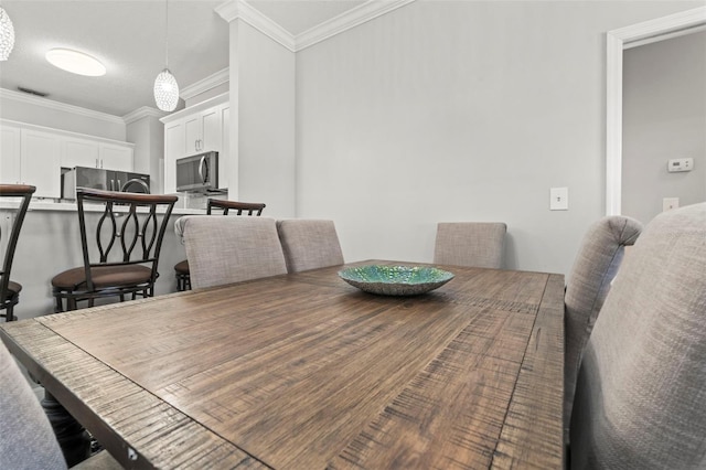 3611 19th St N, Saint Petersburg, FL 33713 - dining space with ornamental molding