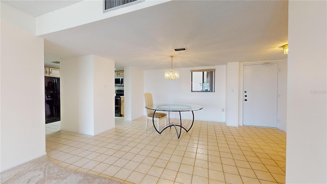 interior space with a notable chandelier