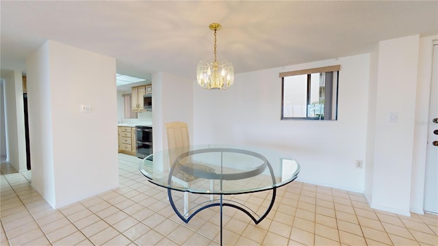 tiled dining area with an inviting chandelier