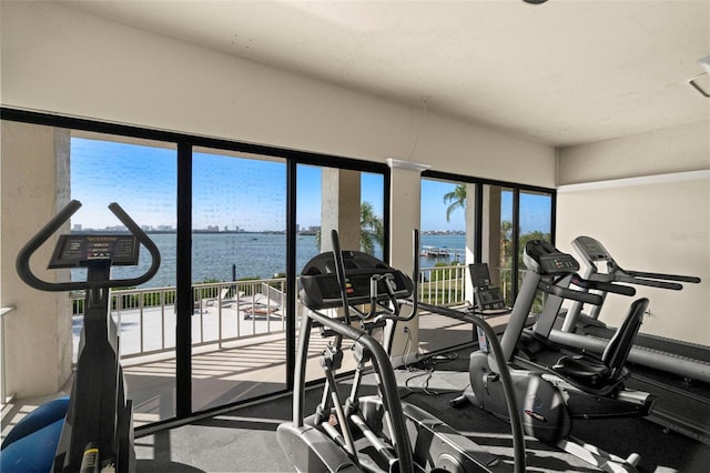 gym with a water view