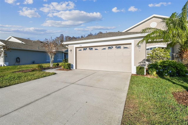 ranch-style house featuring a front lawn and a garage