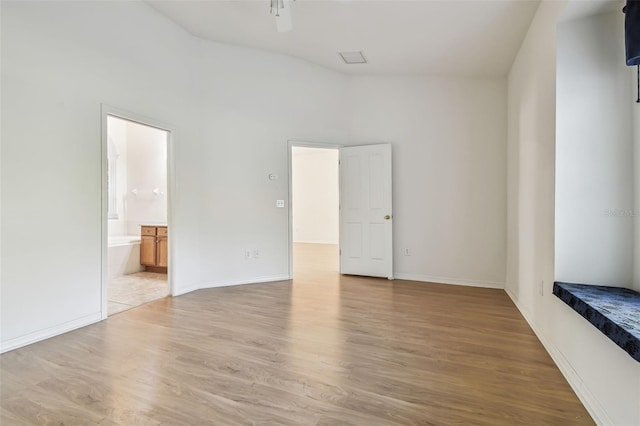 unfurnished room featuring hardwood / wood-style flooring and ceiling fan