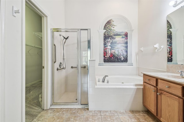 bathroom with vanity and plus walk in shower