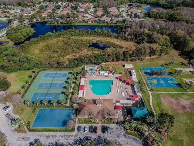 bird's eye view with a water view