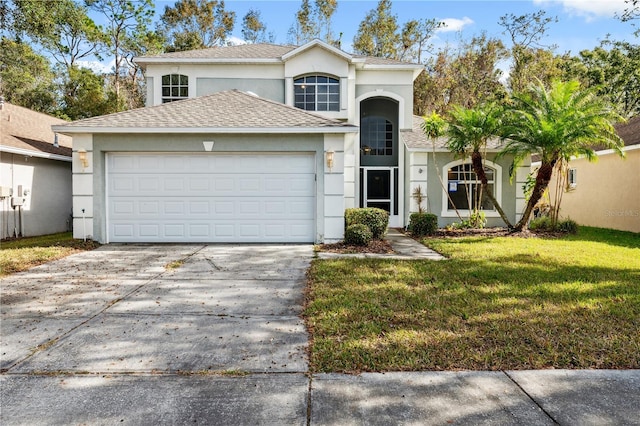 front of property with a garage and a front yard