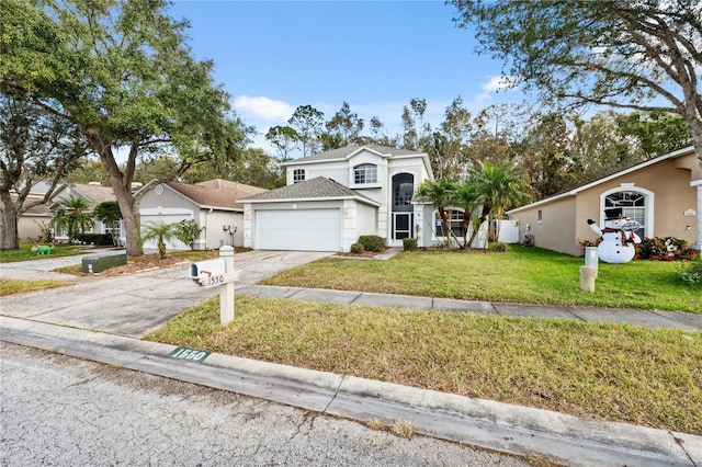 view of front facade featuring a front yard and a garage