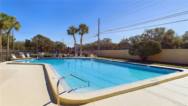 view of pool featuring a patio area