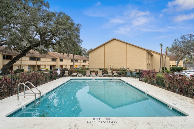 view of swimming pool featuring a patio