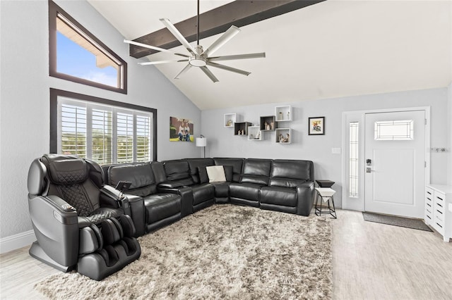 living room featuring beam ceiling, ceiling fan, high vaulted ceiling, and light hardwood / wood-style floors