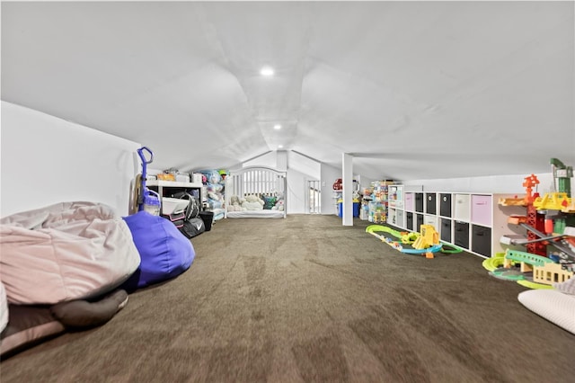 playroom with lofted ceiling and carpet floors