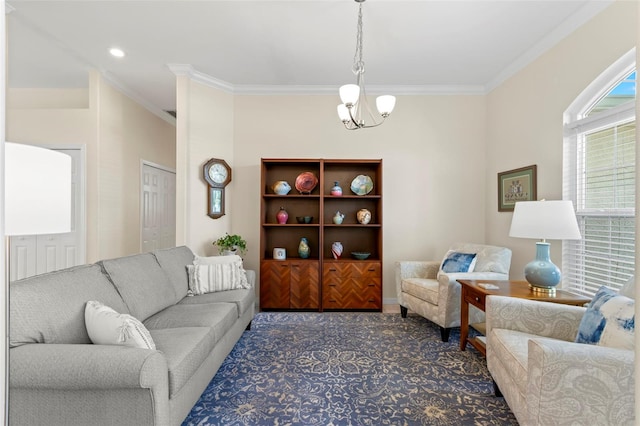 living room with a notable chandelier and ornamental molding