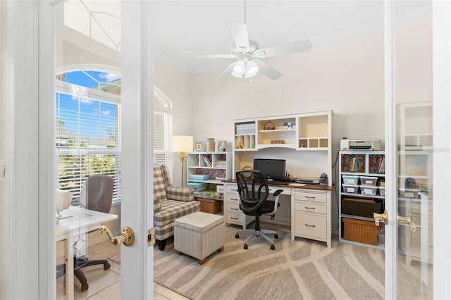 home office featuring french doors, ceiling fan, and ornamental molding