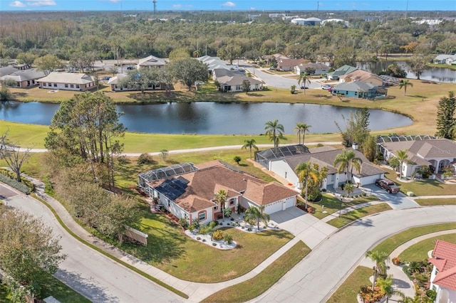 drone / aerial view with a water view