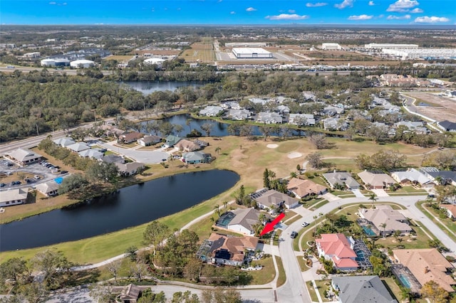 drone / aerial view with a water view