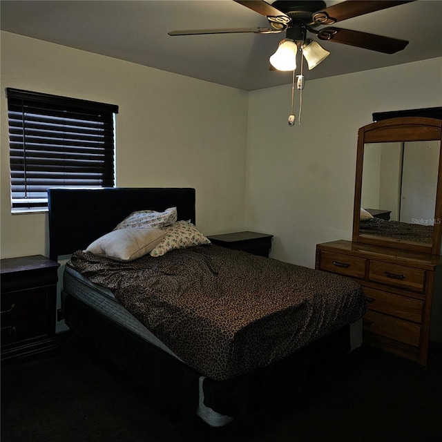 bedroom featuring ceiling fan