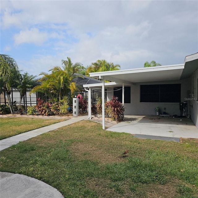 view of yard with a carport