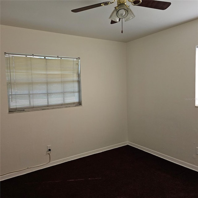 unfurnished room with ceiling fan