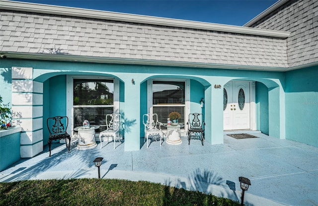 entrance to property with covered porch