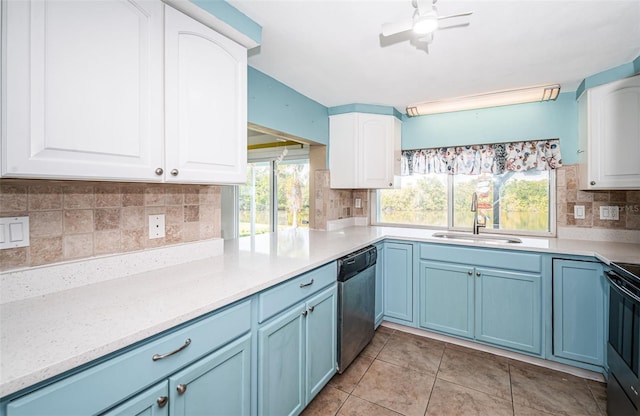 kitchen featuring ceiling fan, dishwasher, sink, blue cabinets, and white cabinets