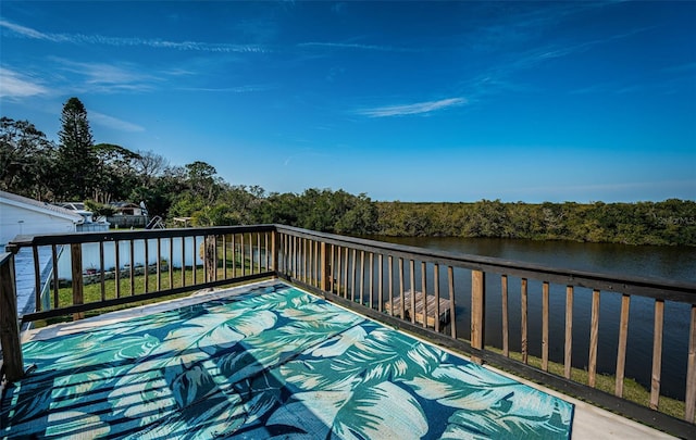 deck featuring a water view