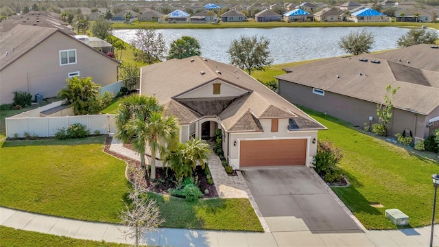 bird's eye view with a water view