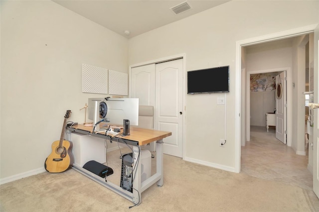 home office featuring light colored carpet