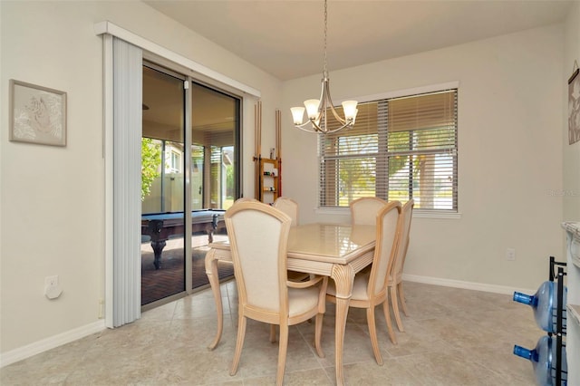 dining room featuring a chandelier